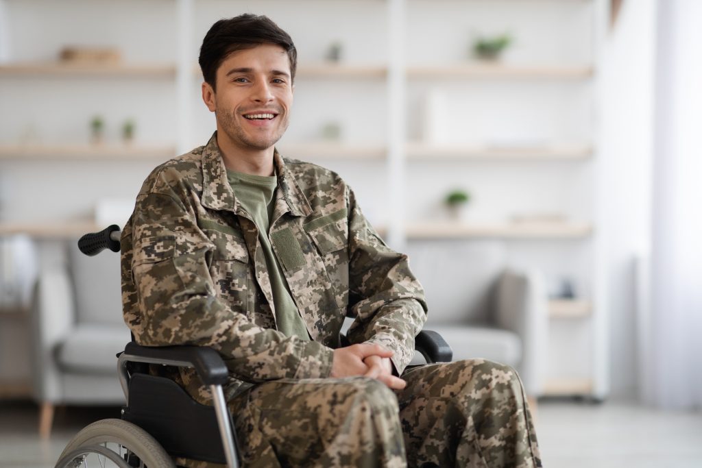 A happy man sitting on wheelchair